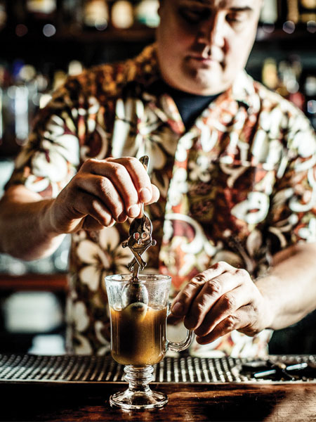 Marcovaldo Dionysus at Smuggler’s Cove making Hot Buttered Rum.