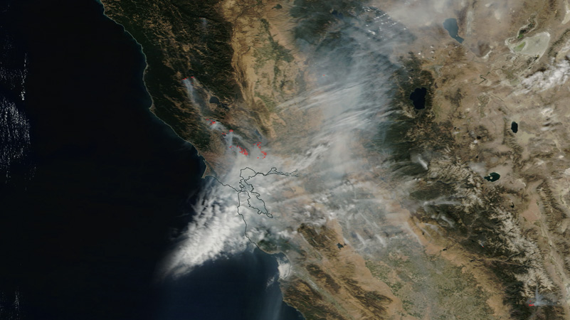 NASA satellite images showed smoke from the North Coast fires driven by the Diablo winds toward San Francisco, east into the Sierra Nevada and south into California’s Central Valley.