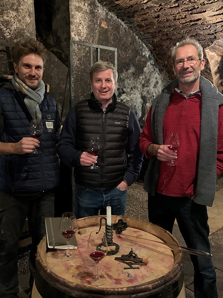 Dixon Brooke (center) with the owners/vignerons of Domaine Follin-Arbelet, father Frank Follin (right) and son Simon